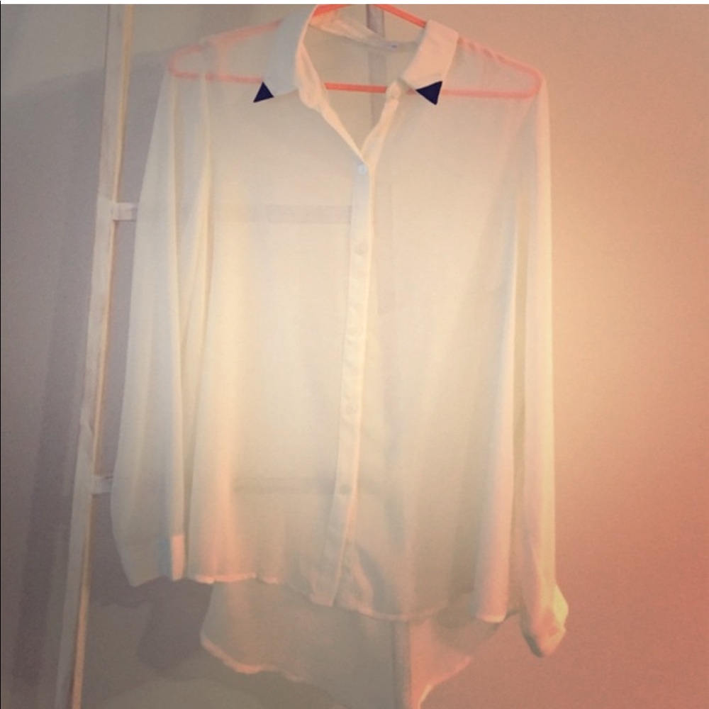 Sheer white long sleeve button down blouse with black collar detail & open back